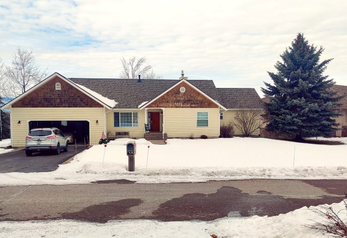 Before photo of a Bigfork residential property in winter, prior to landscape design by Beargrass Landscape Architecture