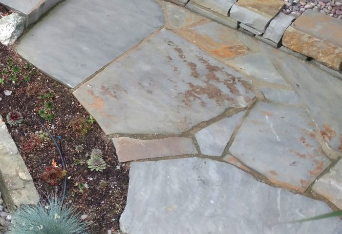 Flagstone patio detail, Whitfish Lake lakeside project by Beargrass Landscape Architecture
